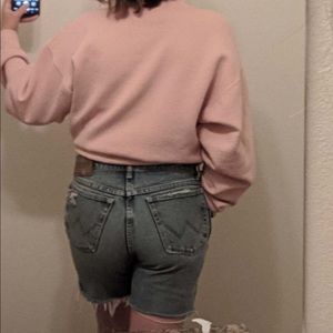 Vintage distressed cut off Wrangler jeans.